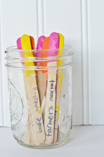 painted sticks in a jar