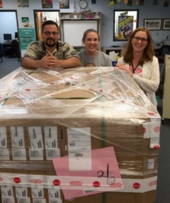 Google certified instructors, Mr. Chad Barnette, Ms. Rachel Best and Mrs. Nicole Erwin welcome the arrival of 230 Google Chromebooks.