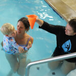 parent in water for infant swim lessons knoxville tn.JPG