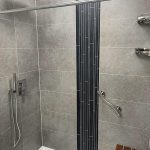Cracked cement Aqua-lock with vertical-accent-trim- shower conversion